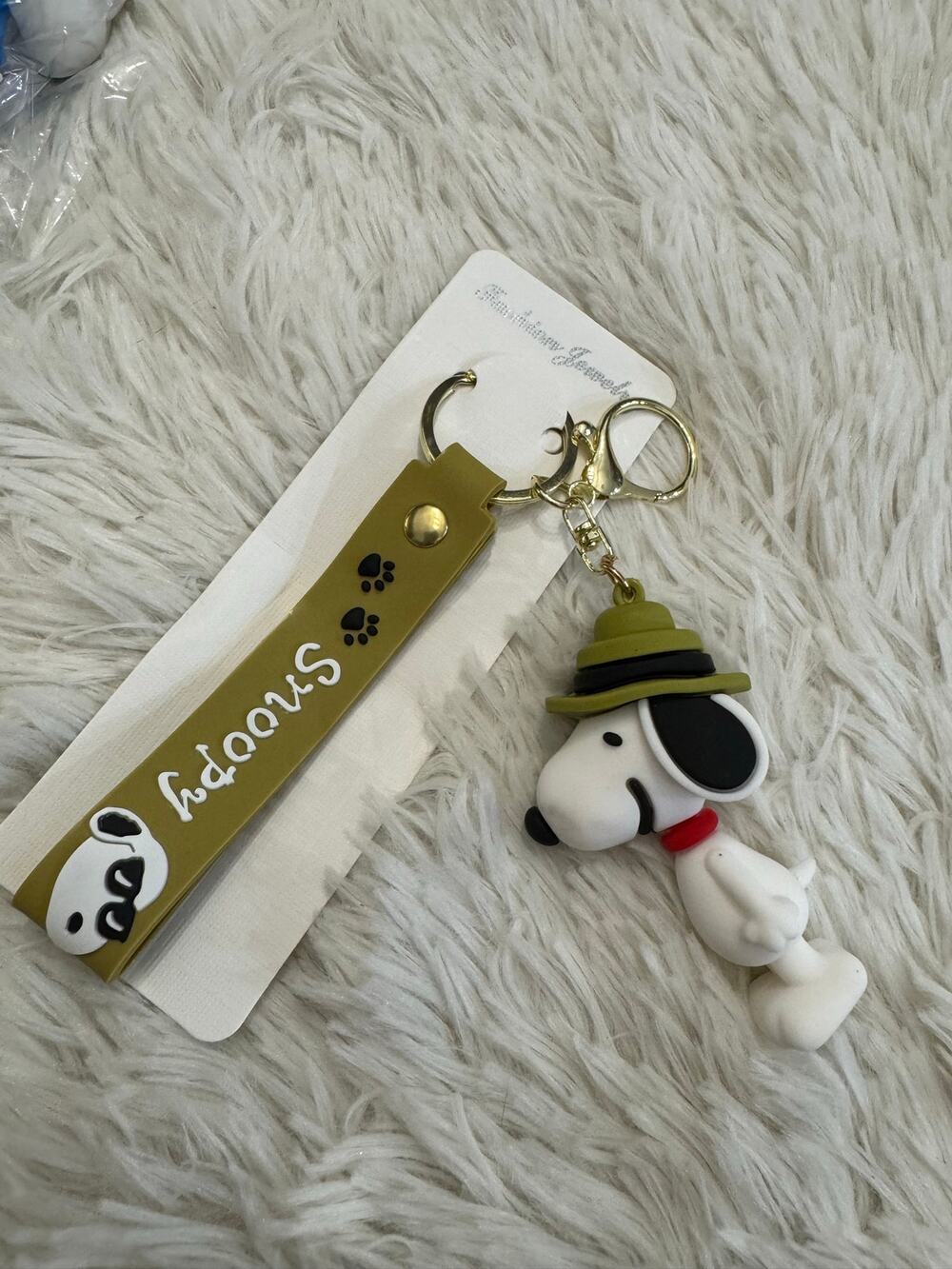Snoopy ranger rubber keychain with green hat and red collar
